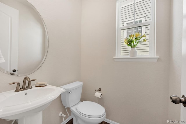 3325 Umber Cir, Castle Rock, CO 80109 - bathroom with a sink, toilet, and baseboards