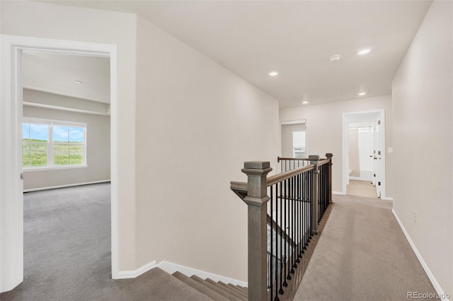 3325 Umber Cir, Castle Rock, CO 80109 - hallway with carpet floors, an upstairs landing, baseboards, and recessed lighting