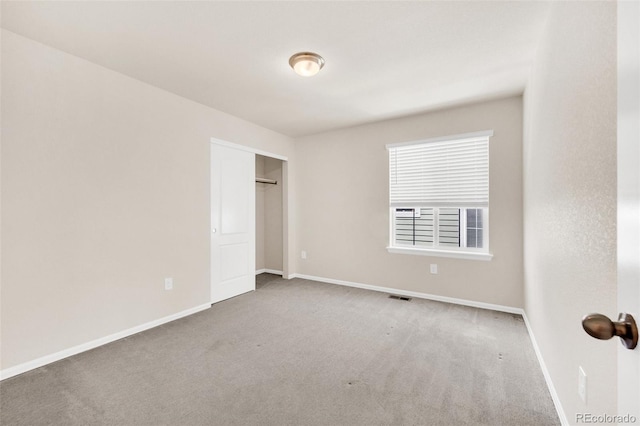 3325 Umber Cir, Castle Rock, CO 80109 - unfurnished bedroom featuring carpet flooring, baseboards, and a closet