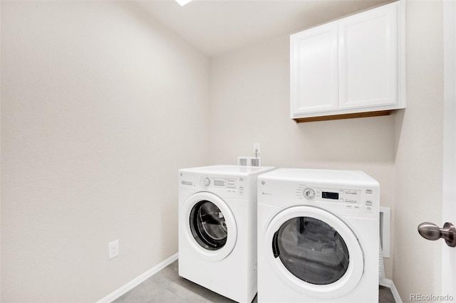 3325 Umber Cir, Castle Rock, CO 80109 - laundry room with washer and dryer, cabinet space, and baseboards