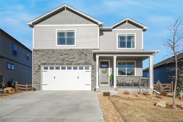 craftsman-style house with a porch and a garage