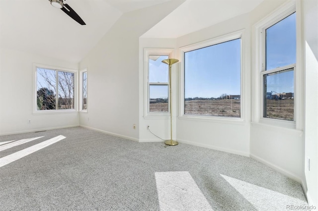 interior space with vaulted ceiling and ceiling fan