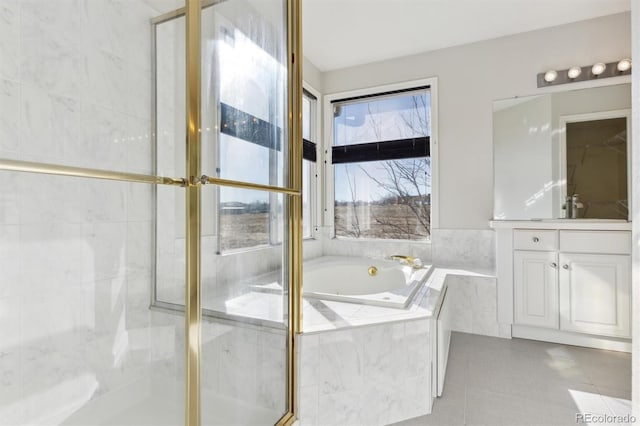 bathroom featuring tile patterned flooring, vanity, and independent shower and bath