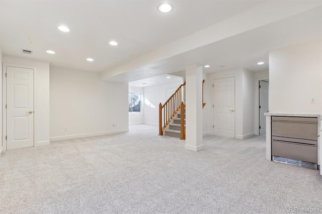 basement with light carpet