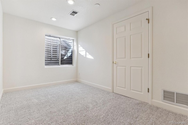 view of carpeted empty room