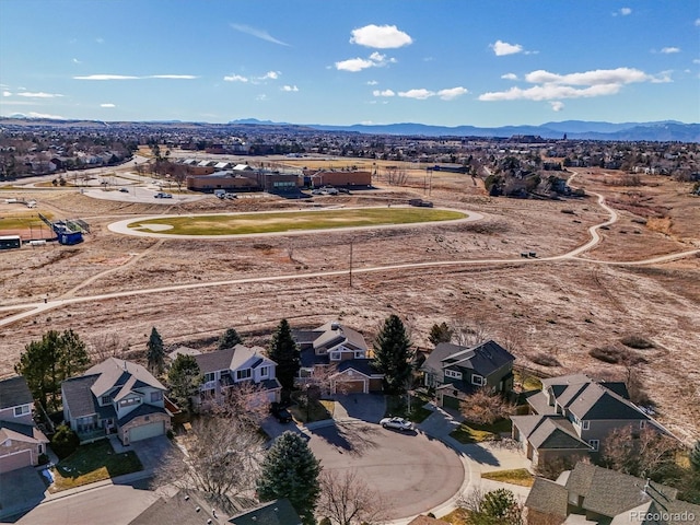 drone / aerial view featuring a mountain view