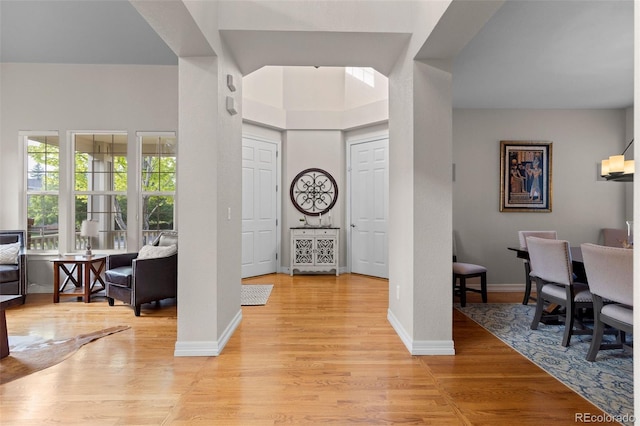 6040 Virgil St, Arvada, CO 80403 - foyer entrance with light wood-style flooring and baseboards
