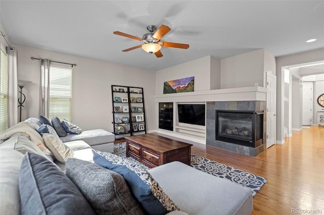 6040 Virgil St, Arvada, CO 80403 - living room with a ceiling fan, wood finished floors, a tile fireplace, and recessed lighting