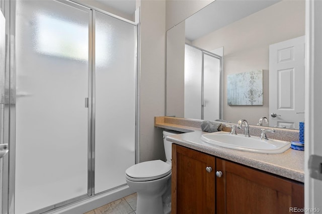 6040 Virgil St, Arvada, CO 80403 - bathroom with a shower stall, toilet, and vanity