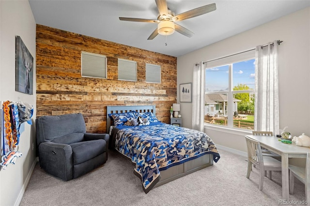 6040 Virgil St, Arvada, CO 80403 - bedroom with wooden walls, an accent wall, carpet floors, baseboards, and a ceiling fan