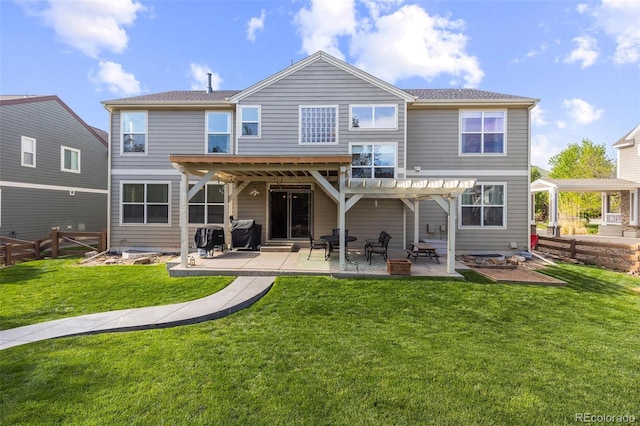 6040 Virgil St, Arvada, CO 80403 - back of property with a pergola and a patio area