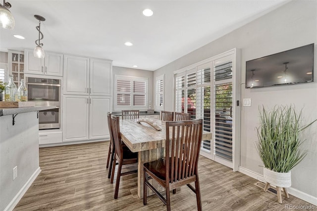 dining room featuring light wood-type flooring