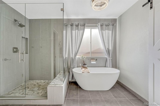 bathroom featuring tile patterned floors and plus walk in shower