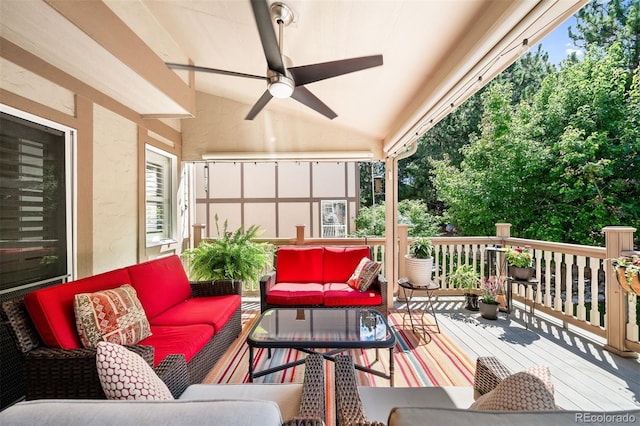 exterior space featuring ceiling fan and an outdoor living space