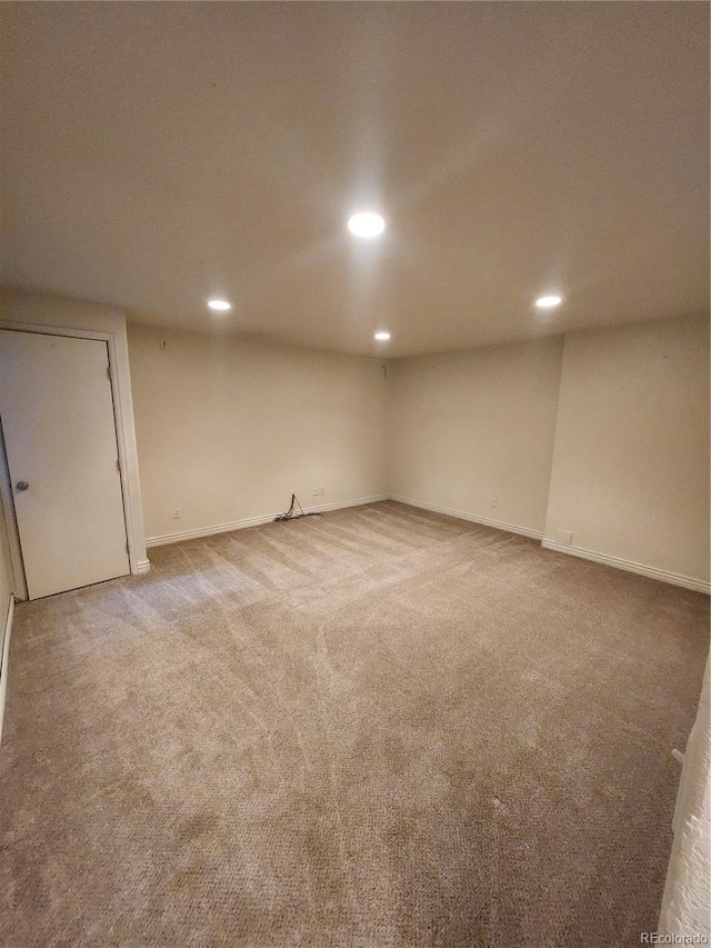 basement featuring carpet flooring