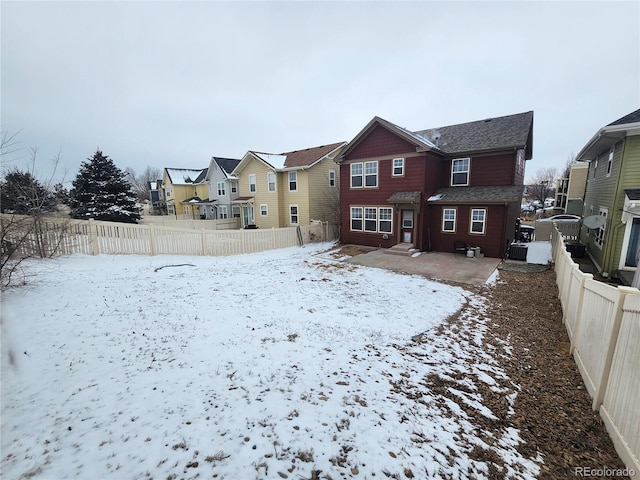 view of snow covered property