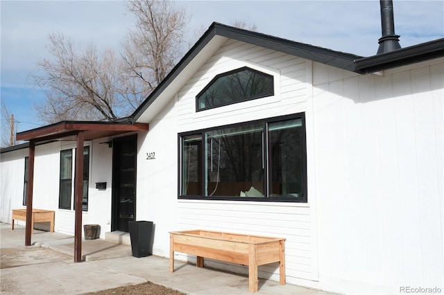 back of house featuring a patio area