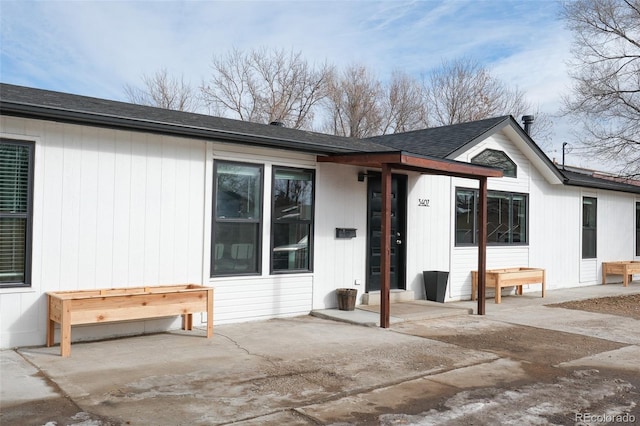 back of house with a patio area