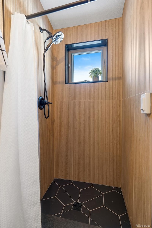 bathroom featuring walk in shower