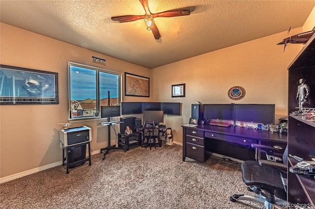 12420 Mount Belford Way, Peyton, CO 80831 - office area featuring a textured ceiling, carpet floors, a ceiling fan, a textured wall, and baseboards