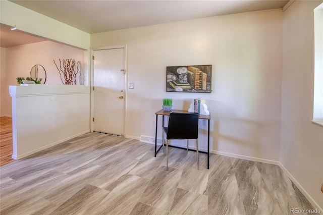 1227 Holmes Dr, Colorado Springs, CO 80909 - entrance foyer with wood finished floors and baseboards