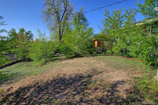 1227 Holmes Dr, Colorado Springs, CO 80909 - view of yard featuring fence