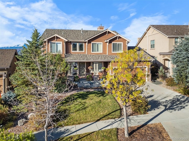 view of front of home featuring a front lawn