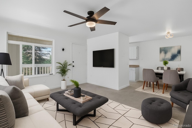 7902 Chase Cir Unit 152, Arvada, CO 80003 - living area with ceiling fan and light colored carpet