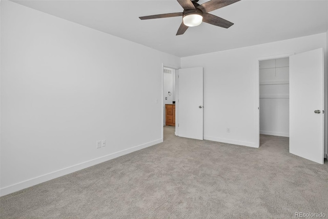 7902 Chase Cir Unit 152, Arvada, CO 80003 - unfurnished bedroom with a spacious closet, carpet floors, and ceiling fan