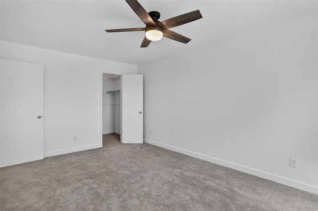 7902 Chase Cir Unit 152, Arvada, CO 80003 - unfurnished bedroom with carpet floors, a spacious closet, and a ceiling fan