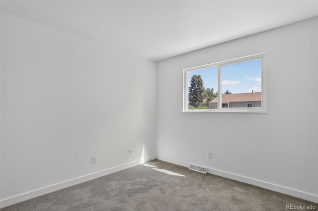 7902 Chase Cir Unit 152, Arvada, CO 80003 - spare room featuring baseboards and carpet