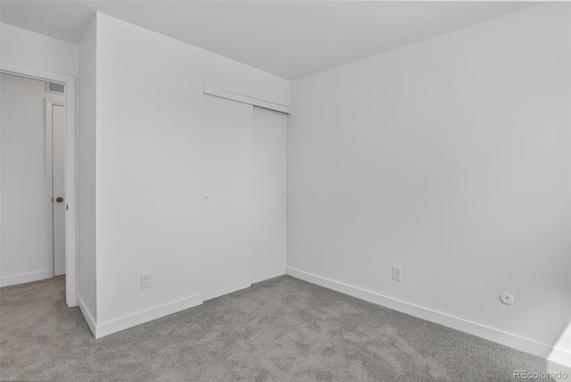 7902 Chase Cir Unit 152, Arvada, CO 80003 - unfurnished bedroom with carpet floors and a closet