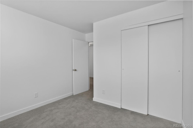 7902 Chase Cir Unit 152, Arvada, CO 80003 - unfurnished bedroom featuring carpet floors and a closet