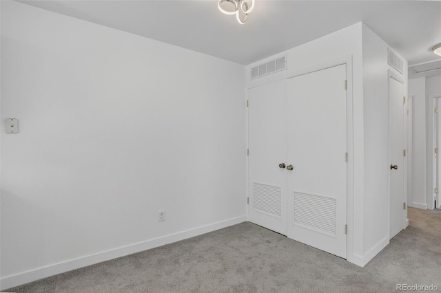 7902 Chase Cir Unit 152, Arvada, CO 80003 - unfurnished bedroom featuring a closet and carpet flooring