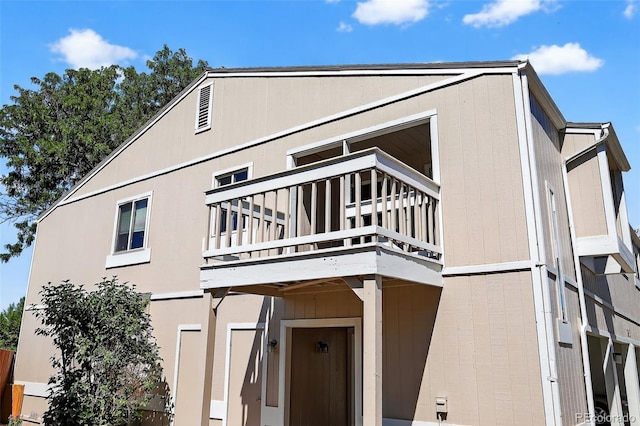 7902 Chase Cir Unit 152, Arvada, CO 80003 - rear view of house featuring a balcony