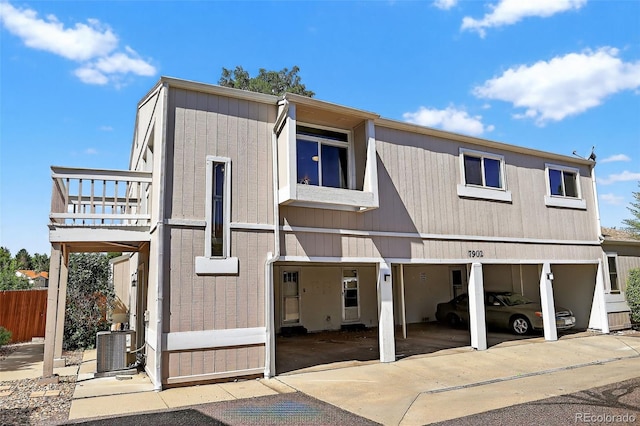 7902 Chase Cir Unit 152, Arvada, CO 80003 - back of house featuring a garage