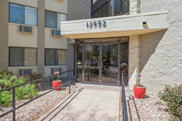 property entrance featuring french doors