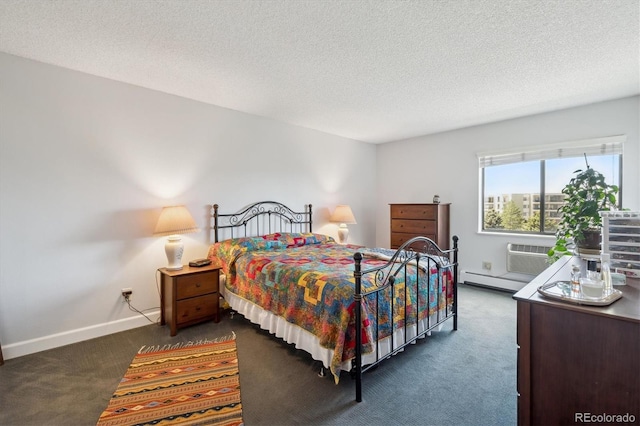 bedroom featuring carpet, a baseboard radiator, a textured ceiling, baseboards, and a wall mounted air conditioner