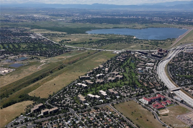 view of property location featuring a water and mountain view