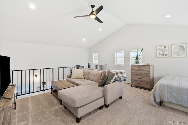 carpeted bedroom featuring vaulted ceiling and ceiling fan