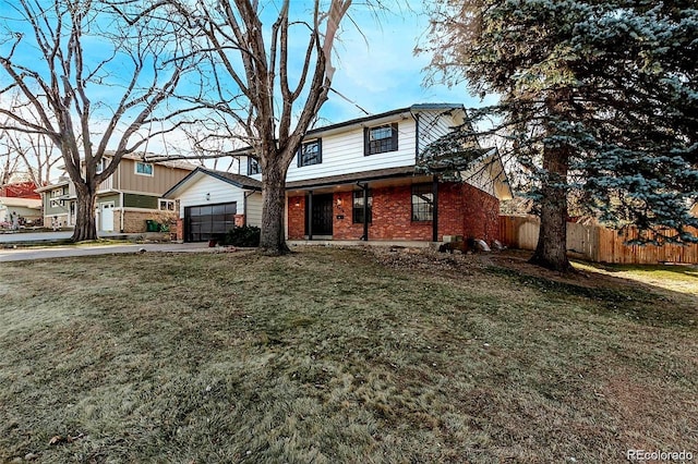 traditional-style home featuring a garage, brick siding, fence, driveway, and a front yard