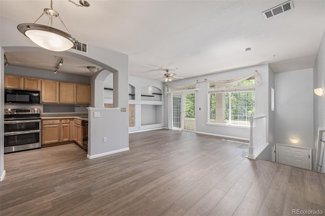 1535 S Florence Way Unit 410, Aurora, CO 80247 - kitchen with black appliances, ceiling fan, wood finished floors, open floor plan, and light countertops