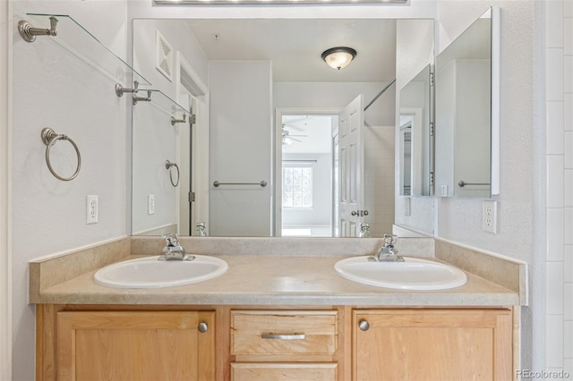 1535 S Florence Way Unit 410, Aurora, CO 80247 - full bath featuring double vanity and ceiling fan