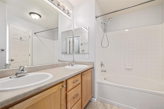 1535 S Florence Way Unit 410, Aurora, CO 80247 - bathroom featuring shower / washtub combination, double vanity, and tile patterned floors