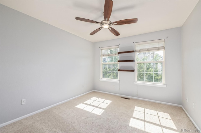 1535 S Florence Way Unit 410, Aurora, CO 80247 - unfurnished room featuring carpet flooring and a ceiling fan