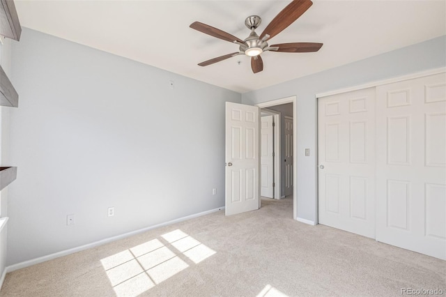 1535 S Florence Way Unit 410, Aurora, CO 80247 - unfurnished bedroom with light colored carpet, a closet, and a ceiling fan