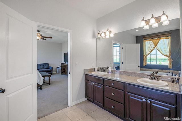 bathroom featuring vanity, ceiling fan, and tile patterned flooring