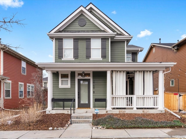 traditional home featuring covered porch