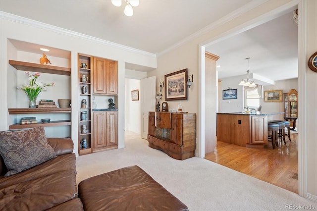 living area with light carpet and ornamental molding