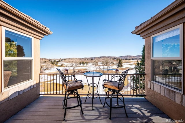 deck with a mountain view